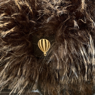 Sac en fourrure Le voyage en panier